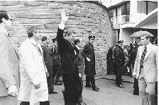Ronald Reagan waves to supporters as he leaves a Washington, D.C., hotel, moments before he was shot in an assassination attempt on 30 March 1981. The president was rushed to George Washington University Hospital and spent eleven days there following surgery. CORBIS